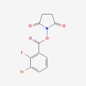 molecular formula C11H7BrFNO4 B8167250 2,5-Dioxopyrrolidin-1-yl 3-bromo-2-fluorobenzoate 