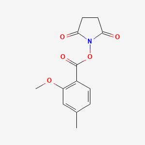 molecular formula C13H13NO5 B8168686 2,5-Dioxopyrrolidin-1-yl 2-methoxy-4-methylbenzoate 