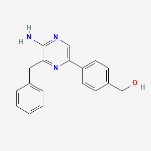 molecular formula C18H17N3O B8169308 2-Amino-3-benzyl-5-(4-hydroxymethylphenyl)-pyrazine 