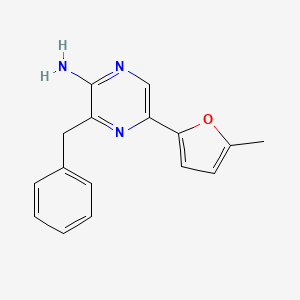 molecular formula C16H15N3O B8169313 2-Amino-3-benzyl-5-(5-methylfuryl)-pyrazine 