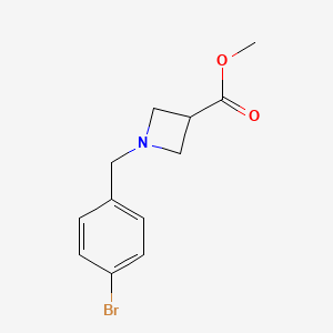 molecular formula C12H14BrNO2 B8171840 Methyl 1-[(4-bromophenyl)methyl]azetidine-3-carboxylate 