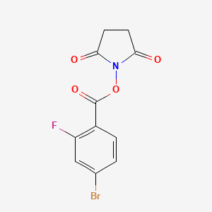 molecular formula C11H7BrFNO4 B8172251 2,5-Dioxopyrrolidin-1-yl 4-bromo-2-fluorobenzoate 