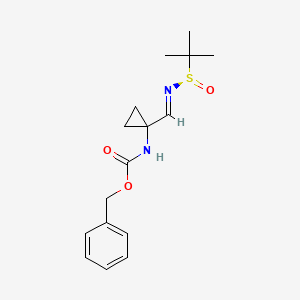 molecular formula C16H22N2O3S B8176198 benzyl N-[1-[(E)-[(R)-tert-butylsulfinyl]iminomethyl]cyclopropyl]carbamate 