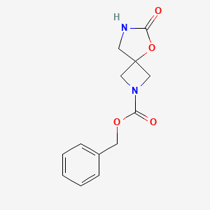 molecular formula C13H14N2O4 B8182056 Benzyl 6-oxo-5-oxa-2,7-diazaspiro[3.4]octane-2-carboxylate 