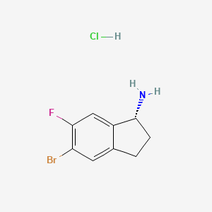 molecular formula C9H10BrClFN B8182221 (R)-5-Bromo-6-fluoro-2,3-dihydro-1H-inden-1-amine hydrochloride 