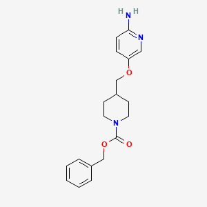 molecular formula C19H23N3O3 B8183092 Benzyl 4-(((6-aminopyridin-3-yl)oxy)methyl)piperidine-1-carboxylate 