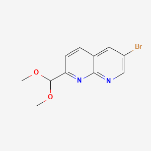 molecular formula C11H11BrN2O2 B8183953 6-Bromo-2-(dimethoxymethyl)-1,8-naphthyridine 
