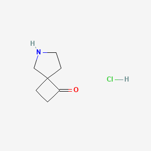molecular formula C7H12ClNO B8184417 6-Azaspiro[3.4]octan-3-one;hydrochloride 