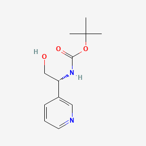 molecular formula C12H18N2O3 B8184614 tert-butyl N-[(1R)-2-hydroxy-1-pyridin-3-ylethyl]carbamate 