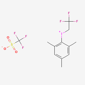 molecular formula C12H13F6IO3S B8184749 (2,2,2-Trifluoro-ethyl)-(2,4,6-trimethyl-phenyl)-iodonium triflate 