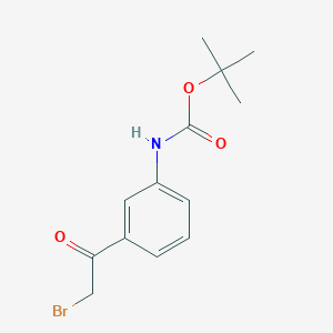 molecular formula C13H16BrNO3 B8185038 [3-(2-Bromo-acetyl)-phenyl]-carbamic acid tert-butyl ester 