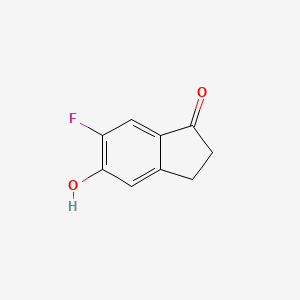 molecular formula C9H7FO2 B8185074 6-Fluoro-5-hydroxy-indan-1-one 