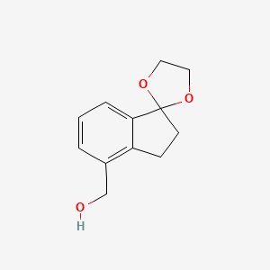 molecular formula C12H14O3 B8185489 4-Hydroxymethyl-indan-1-one 1,2-ethanediol ketal 