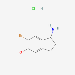 molecular formula C10H13BrClNO B8186358 6-Bromo-5-methoxy-indan-1-ylamine hydrochloride 