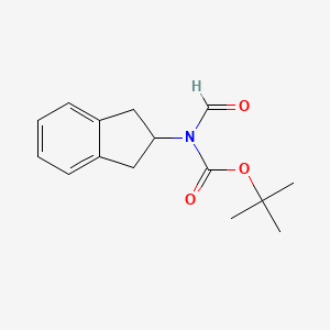 molecular formula C15H19NO3 B8186575 N-Boc-N-Indan-2-yl-formamide 