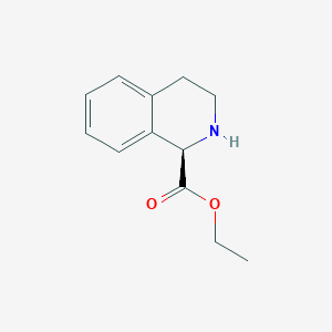 molecular formula C12H15NO2 B8188417 (R)-1,2,3,4-Tetrahydro-isoquinoline-1-carboxylic acid ethyl ester 