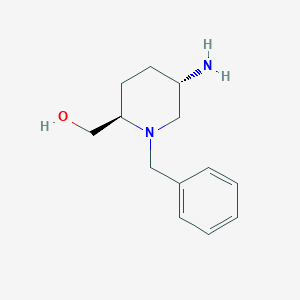 molecular formula C13H20N2O B8189336 trans-(5-Amino-1-benzyl-piperidin-2-yl)-methanol 
