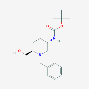 molecular formula C18H28N2O3 B8189344 trans-(1-Benzyl-6-hydroxymethyl-piperidin-3-yl)-carbamic acid tert-butyl ester 