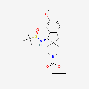 molecular formula C23H36N2O4S B8189413 tert-butyl (1S)-1-[[(R)-tert-butylsulfinyl]amino]-6-methoxyspiro[1,3-dihydroindene-2,4'-piperidine]-1'-carboxylate 