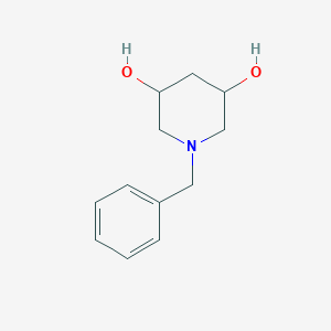 molecular formula C12H17NO2 B8189429 1-苄基哌啶-3,5-二醇 