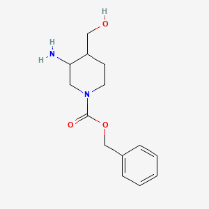 molecular formula C14H20N2O3 B8189628 3-Amino-4-hydroxymethyl-piperidine-1-carboxylic acid benzyl ester 