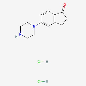 molecular formula C13H18Cl2N2O B8190231 5-Piperazin-1-YL-indan-1-one dihydrochloride 