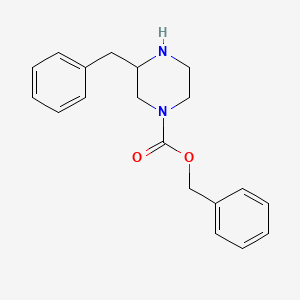 molecular formula C19H22N2O2 B8190275 3-Benzyl-piperazine-1-carboxylic acid benzyl ester 