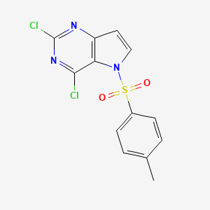 molecular formula C13H9Cl2N3O2S B8190935 2,4-Dichloro-5-(toluene-4-sulfonyl)-5H-pyrrolo[3,2-d]pyrimidine 