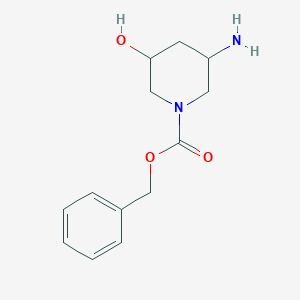 molecular formula C13H18N2O3 B8191783 3-Amino-5-hydroxy-piperidine-1-carboxylic acid benzyl ester 