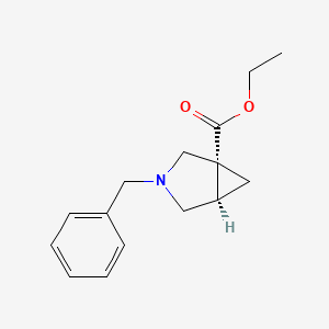 molecular formula C15H19NO2 B8194599 Ethyl (1R,5R)-3-benzyl-3-azabicyclo[3.1.0]hexane-1-carboxylate 