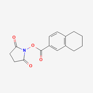 molecular formula C15H15NO4 B8198034 N-(5,6,7,8-Tetrahydro-2-naphthoyloxy)succinimide 