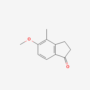 molecular formula C11H12O2 B8198949 5-Methoxy-4-methyl-2,3-dihydro-1H-inden-1-one 