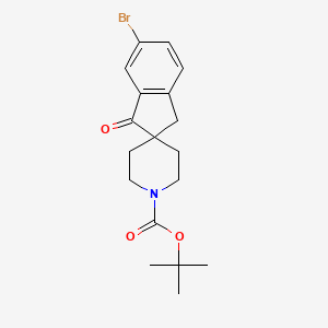 molecular formula C18H22BrNO3 B8199959 tert-Butyl 6-bromo-1-oxo-1,3-dihydrospiro[indene-2,4'-piperidine]-1'-carboxylate 