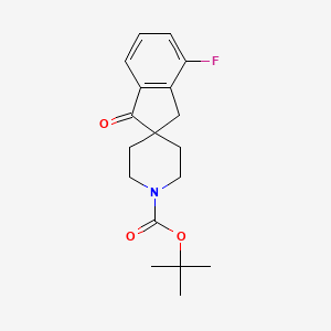 molecular formula C18H22FNO3 B8199991 tert-Butyl 4-fluoro-1-oxo-1,3-dihydrospiro[indene-2,4'-piperidine]-1'-carboxylate 