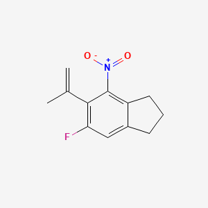 molecular formula C12H12FNO2 B8200550 6-Fluoro-4-nitro-5-(prop-1-en-2-yl)-2,3-dihydro-1H-indene 