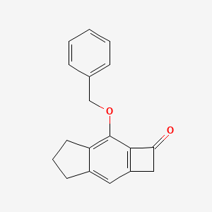 molecular formula C18H16O2 B8200607 7-(Benzyloxy)-2,4,5,6-tetrahydro-1H-cyclobuta[f]inden-1-one 