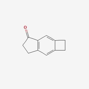 molecular formula C11H10O B8200800 5,6-Dihydro-1H-cyclobuta[f]inden-4(2H)-one 