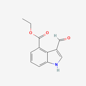 molecular formula C12H11NO3 B8200910 3-Formyl-4-ethoxycarbonyl-1H-indole 