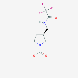 molecular formula C12H19F3N2O3 B8204989 1,1-Dimethylethyl(3S)-3-{[(trifluoroacetyl)amino]methyl}-1-pyrrolidinecarboxylate 