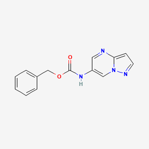 molecular formula C14H12N4O2 B8208041 benzyl N-pyrazolo[1,5-a]pyrimidin-6-ylcarbamate 