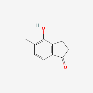 molecular formula C10H10O2 B8208454 4-Hydroxy-5-methyl-2,3-dihydro-1H-inden-1-one 