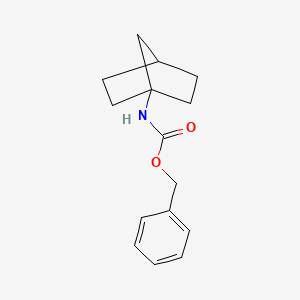 molecular formula C15H19NO2 B8210544 benzyl N-(1-bicyclo[2.2.1]heptanyl)carbamate 