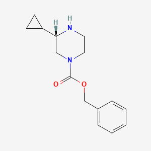 molecular formula C15H20N2O2 B8211662 benzyl (3S)-3-cyclopropylpiperazine-1-carboxylate 