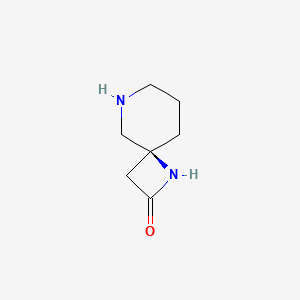 (4S)-1,8-diazaspiro[3.5]nonan-2-one