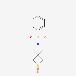 molecular formula C12H15NO3S2 B8220547 6-(4-Methylphenyl)sulfonyl-2lambda4-thia-6-azaspiro[3.3]heptane 2-oxide 