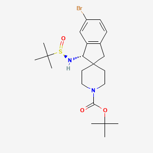 molecular formula C22H33BrN2O3S B8224247 Spiro[2H-indene-2,4'-piperidine]-1'-carboxylic acid, 5-bromo-3-[[(R)-(1,1-dimethylethyl)sulfinyl]amino]-1,3-dihydro-, 1,1-dimethylethyl ester, (3S)- 