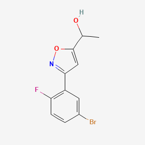 molecular formula C11H9BrFNO2 B8225264 1-[3-(5-Bromo-2-fluorophenyl)-1,2-oxazol-5-yl]ethanol 