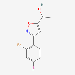 molecular formula C11H9BrFNO2 B8225331 1-[3-(2-Bromo-4-fluorophenyl)-1,2-oxazol-5-yl]ethanol 