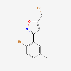 molecular formula C11H9Br2NO B8225538 5-(Bromomethyl)-3-(2-bromo-5-methylphenyl)-1,2-oxazole 