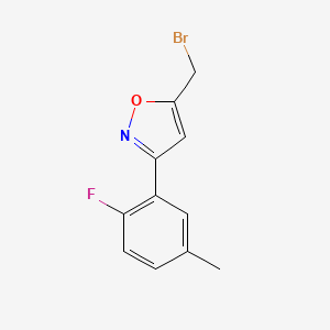 molecular formula C11H9BrFNO B8225623 5-(Bromomethyl)-3-(2-fluoro-5-methylphenyl)-1,2-oxazole 